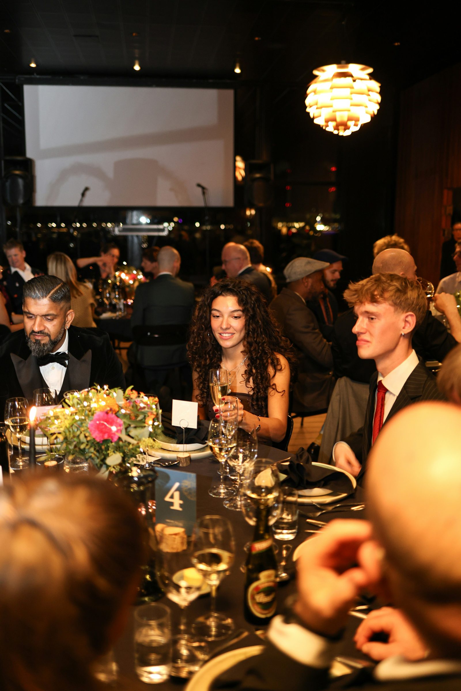 Guests seated together at a gala dinner